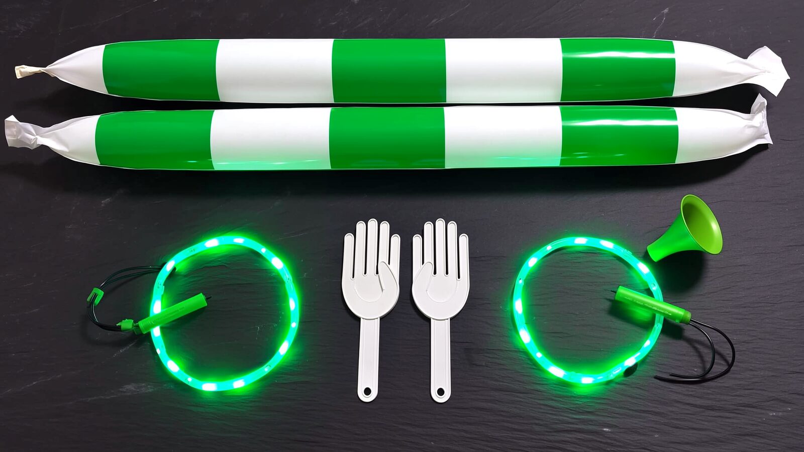 The full matchday loadout: thundersticks, LED wristbands, hand clappers and the mini horn