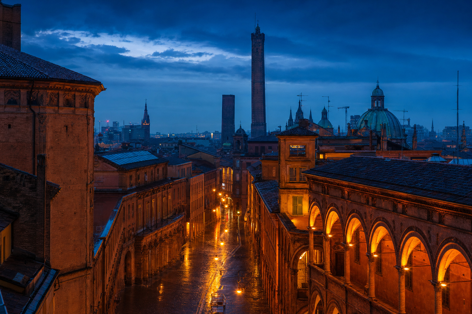 The porticoes and Two Towers of Bologna at dusk
